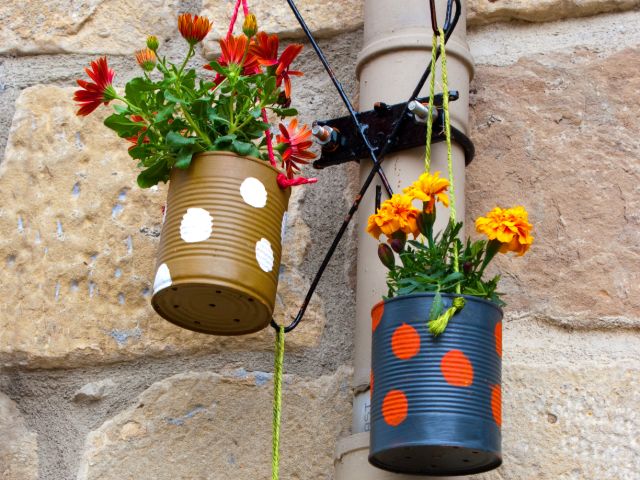 Plant pots made out of tin cans